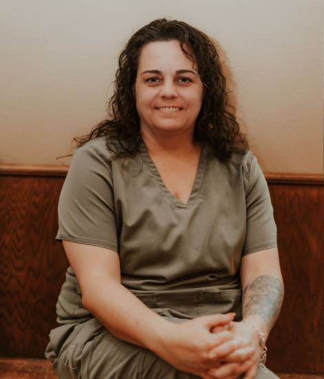 staff sitting and smiling